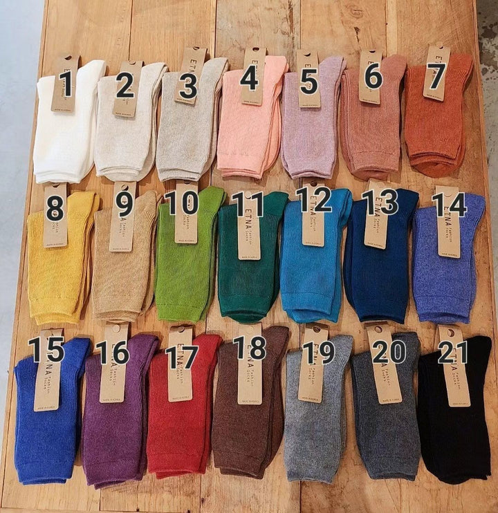 Solid color pitted socks ($100/4 pairs)