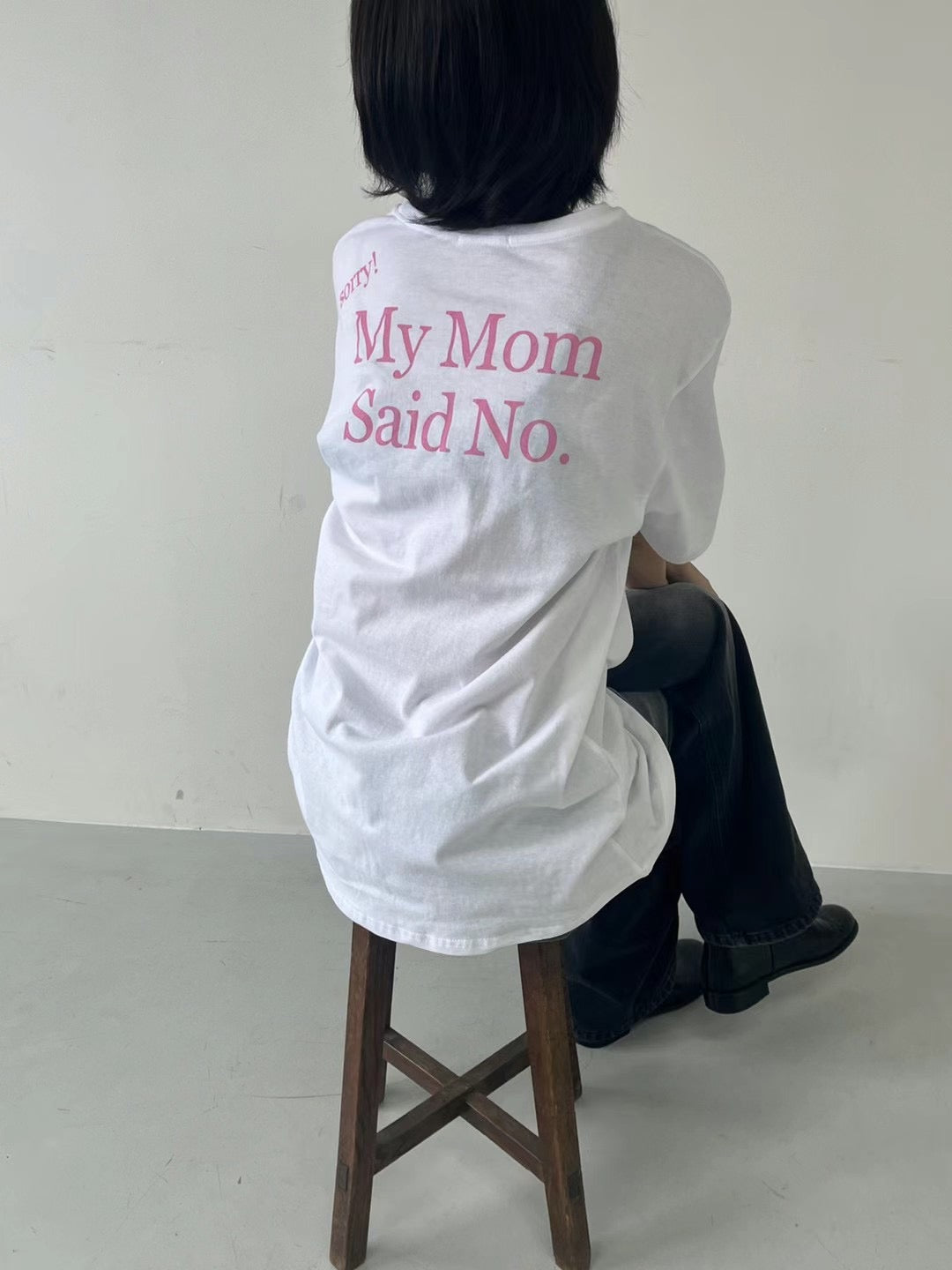 Carrying "My Mon Said No" Tee