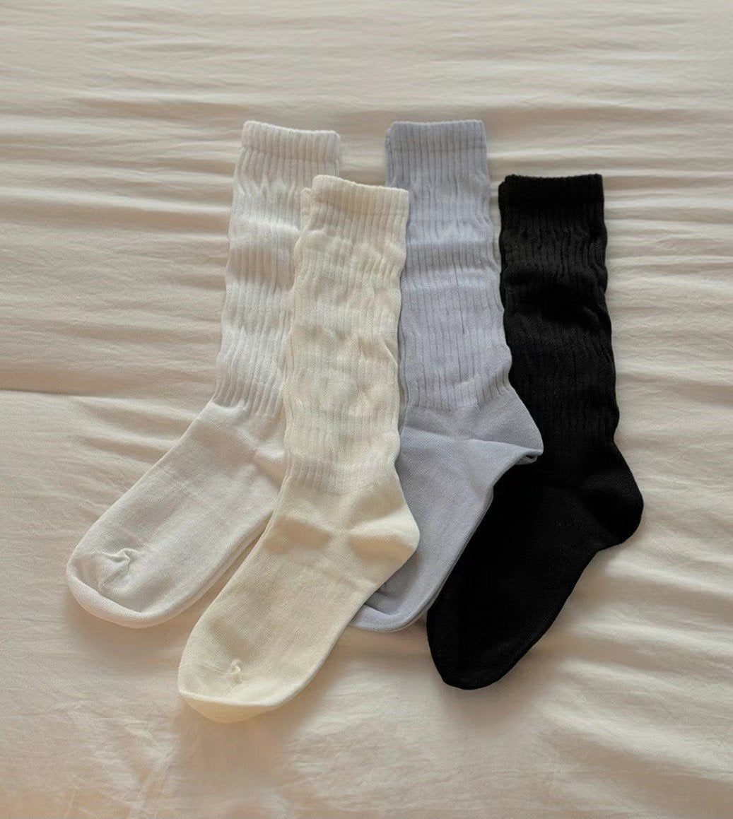 Piles of thin socks ($100/2 pairs)